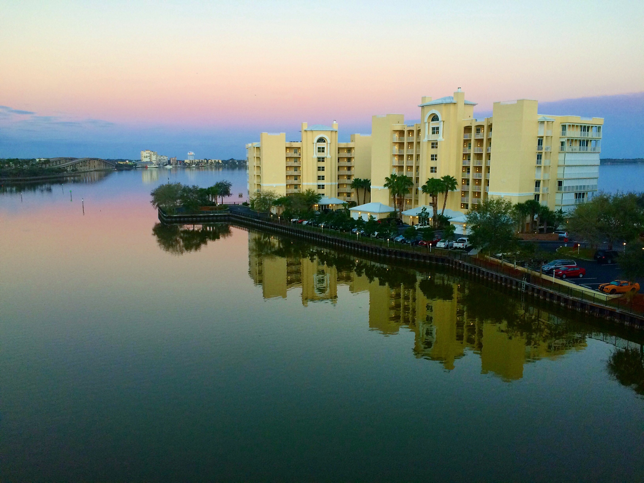 Island Pointe buildings casting reflections onto calm Lagoon waters by 134 resident DK (iPhone 5s)